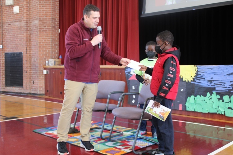 Poquonock had a special guest reader for #ReadAcrossAmerica, former student & Author of ‘The Hungry Primate,” Timi Adewunmi. #studentwriters #publishedauthor #earlyliteracy #weareWINdsor