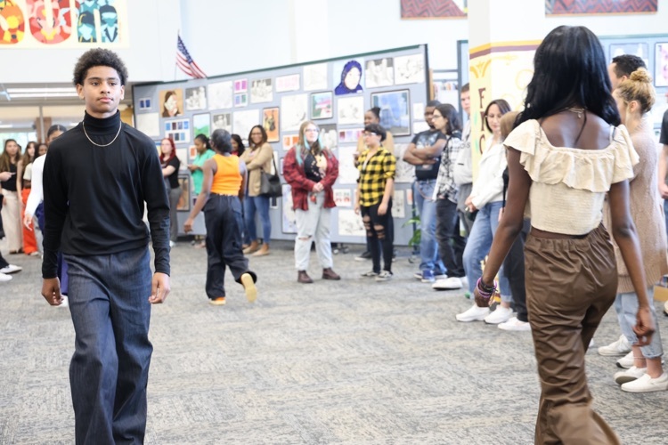 fashion and design students during fashion show 